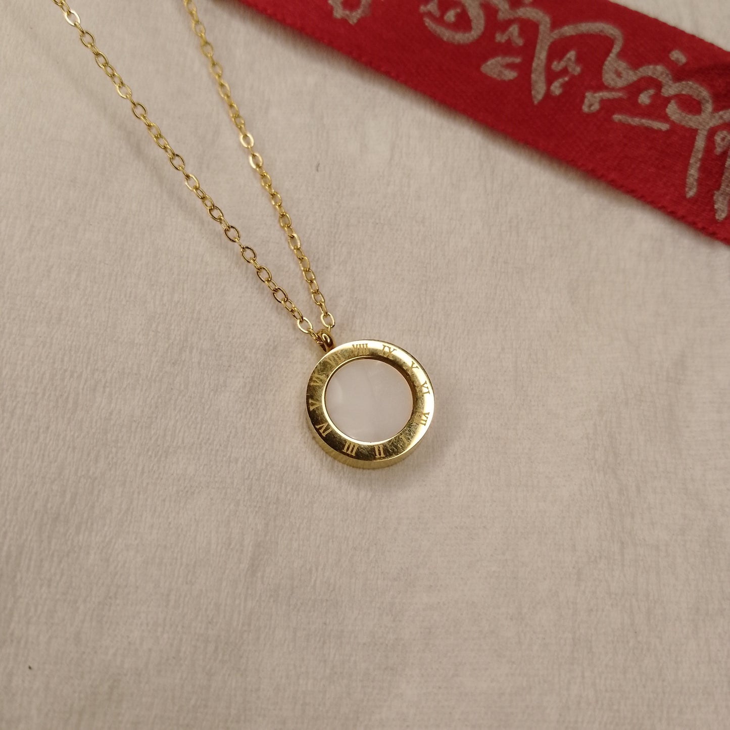 Round black and white pendant
