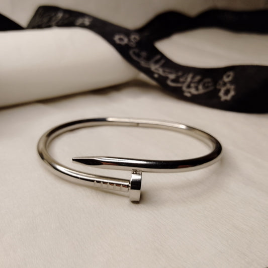Silver nail style handcuff
